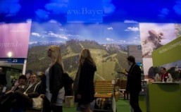 Fair-goers visit the Bavaria stand at the ITB International Travel Trade Fair in Berlin March 5, 2014. ©AFP PHOTO / JOHN MACDOUGALL