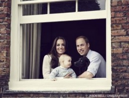 The Duke and Duchess of Cambridge pose with their son Prince George. In a handout picture released by Kensington Palace and Camera Press on March 29, 2014 Britain's Prince William, Duke of Cambridge (R) and Britain's Catherine, Duchess of Cambridge (L) pose with their son Prince George of Cambridge (C) and pet dog Lupo at their residence in Kensington Palace in mid March 2014. Prince William and his wife Kate released a rare family photo on Saturday showing the couple with their eight-month-old son Prince George, ahead of their overseas tour to Australia and New Zealand. ©AFP PHOTO / KENSINGTON PALACE / CAMERA PRESS / JASON BELL