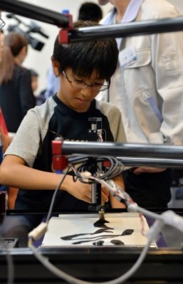 Robot turning Japanese children into master calligraphers