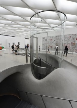 A view of the cylindrical elevator which brings visitors up to the third floor gallery, at the Broad Museum, Los Angeles ©ROBYN BECK / AFP