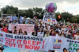 Thousands march on climate change in Manila, Brisbane