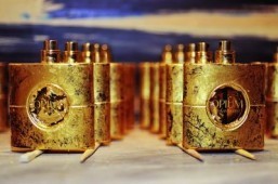 Yves Saint Laurent presents gold leafed bottle for Opium fragrance
