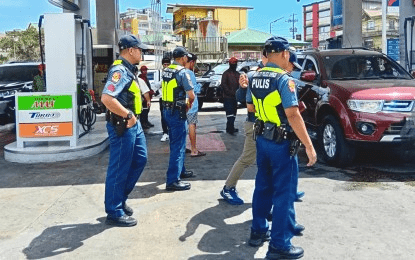 2 gas stations charged for alleged profiteering