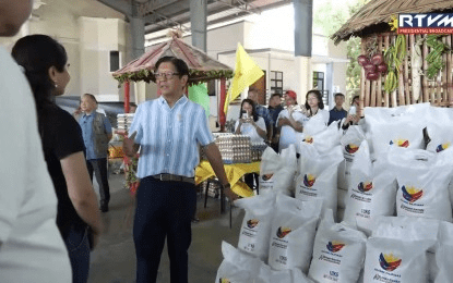 Marcos rolls out cash, rice aid to vendors, barangays in Palayan City