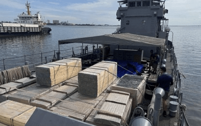 Navy ships ferry aid, construction materials to Masbate, Cebu